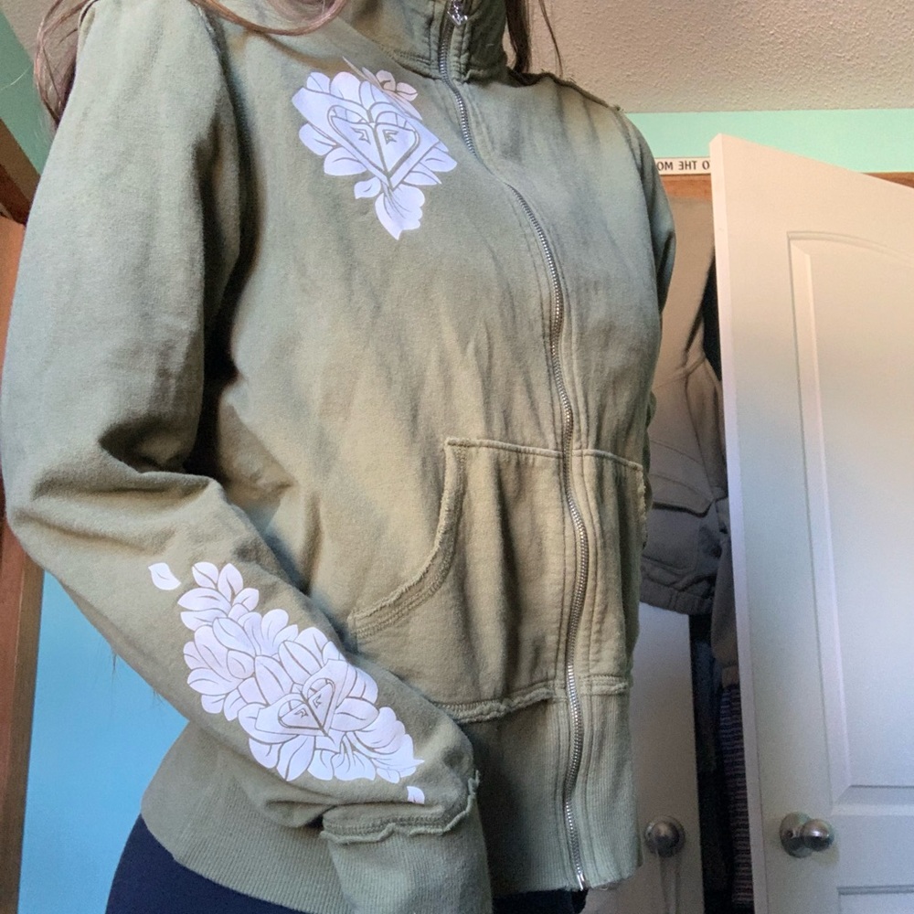 Green ROXY sip up sweater with flower detailing